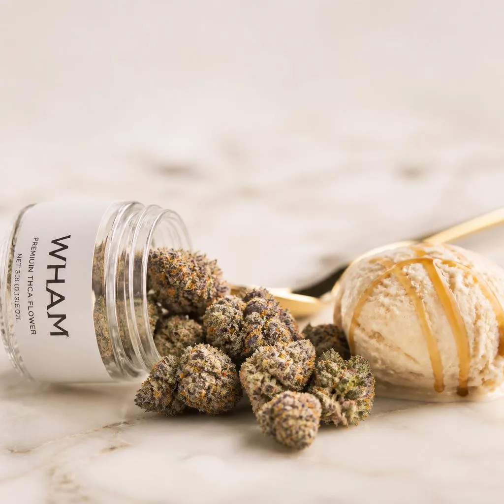Frosty dessert THCa flower spilling from a NexaDistro jar on marble, sweet creamy styling.